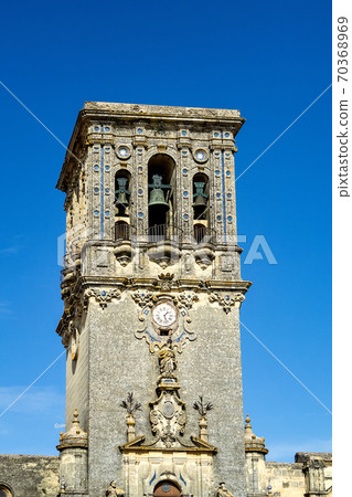 Bell tower of Santa Maria de la Asuncion church in Arcos de la Frontera, Spain 70368969