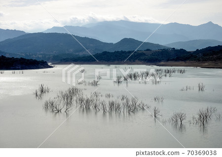 The artificial lake Embalse de Guadalcacin in Andalusia, Spain. 70369038