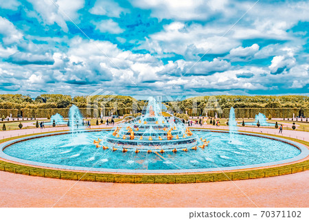Latona Fountain Pool, opposite the main building of the Palace of Versailles, created  by Sun-King Louis XIV. 70371102
