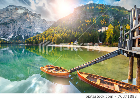 Wooden boats on the alpine lake, Dolomites, Italy, Europe 70371888