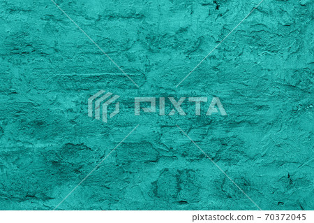 Blue plaster brick wall texture.Old retro building background copy space.Turquoise stone surface,detailed stone backdrop 70372045