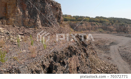 Rocky soil structure in a mining quarry. Rocky soil structure in a mining quarry. 70372771