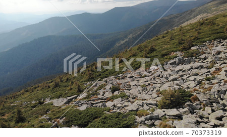 Smooth slope in the mountains. Smooth slope in the mountains. 70373319