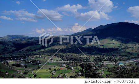 Topview of village in mountains. 70375535