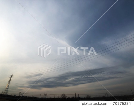 Electric wires and magnificent sky Electric wires and magnificent sky 70376224