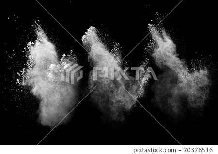 White powder explosion cloud against black background.White dust particles splash. 70376516