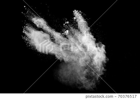 White powder explosion cloud against black background.White dust particles splash. 70376517