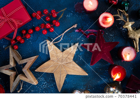 Christmas flat lay scene with golden decorations Christmas flat lay scene with golden decorations 70378441