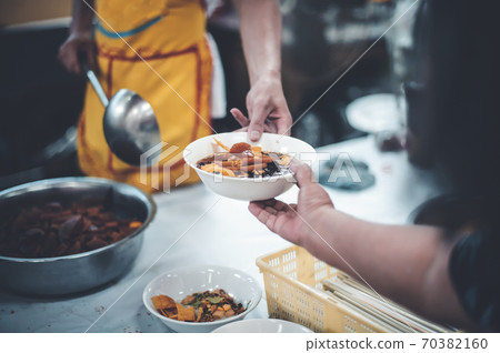 Concept of free food serving Concept of free food serving 70382160