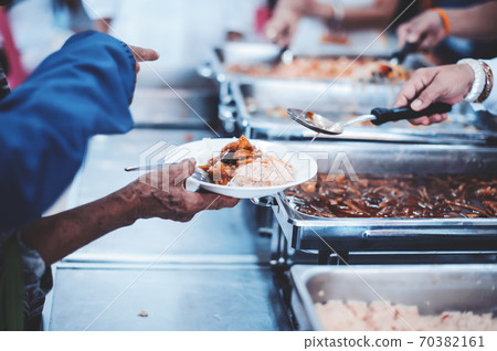 Concept of free food serving Concept of free food serving 70382161