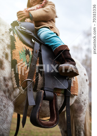 Unrecognizable Kid Riding Appaloosa Pony Unrecognizable Kid Riding Appaloosa Pony 70383336
