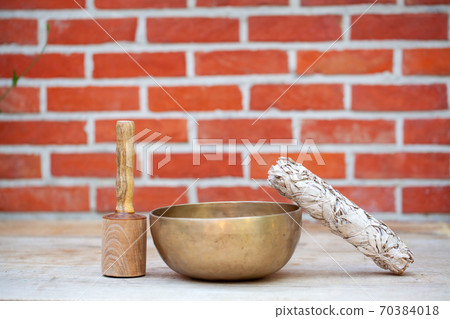 Dried white sage and holistic healing Tibetan singing bowls Dried white sage and holistic healing Tibetan singing bowls 70384018