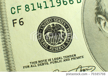 Closeup federal reserve symbol on dollar banknote Closeup federal reserve symbol on dollar banknote 70385708