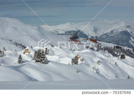 Skiing slopes, with many people 70387698