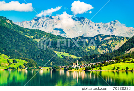 Reschen am See or Resia, a village on Lake Reschen in South Tyrol, Italy 70388223