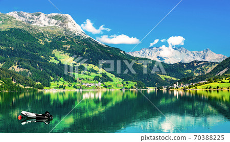 Reschensee, an artificial lake in the Italian Alps Reschensee, an artificial lake in the Italian Alps 70388225