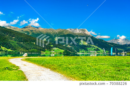 Road at Lake Reschen in Italian Alps Road at Lake Reschen in Italian Alps 70388226