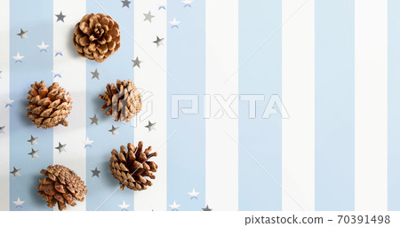 Christmas pinecones with star confetti Christmas pinecones with star confetti 70391498