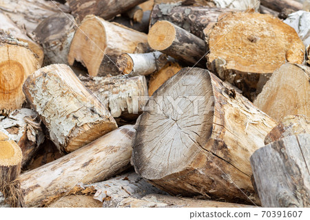 Pile of firewood and wood logs, stock of fire wood for winter Pile of firewood and wood logs, stock of fire wood for winter 70391607