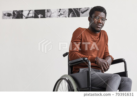Handicapped African-American Man Looking at Camera Handicapped African-American Man Looking at Camera 70391631