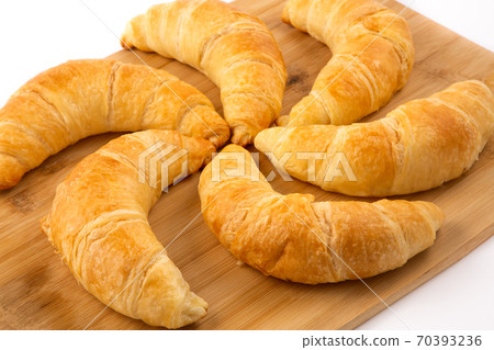 Croissant bread of bake Breakfast in the morning for health or diet food in Wooden tray on the white background 70393236