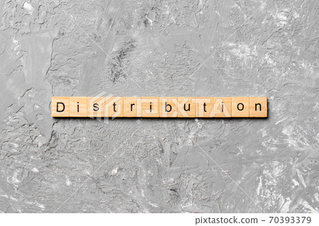 distribution word written on wood block. distribution text on table, concept distribution word written on wood block. distribution text on table, concept 70393379
