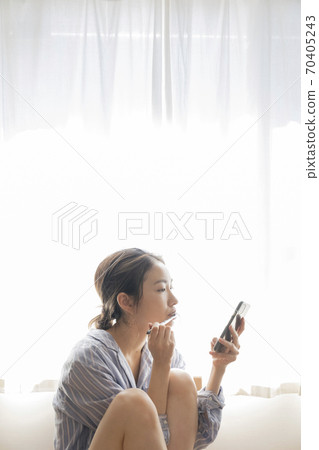 woman brushing teeth woman brushing teeth 70405243