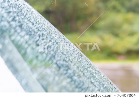 Water drop on the windshield Water drop on the windshield 70407804