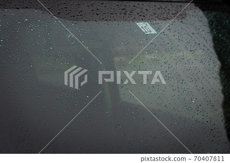 Water drop on the windshield Water drop on the windshield 70407811