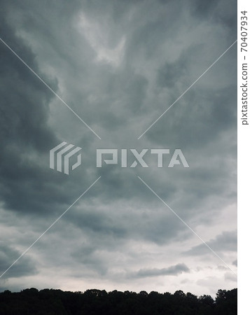 Dark clouds, sky and mountains 70407934