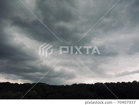 Dark clouds, sky and mountains 70407937
