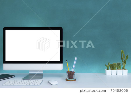 Computer with blank white copy space for text, Mockup design desktop computer in office on white table with keyboard and Coffee cub, Work place concept, Cactus in pot. Computer with blank white copy space for text, Mockup design desktop computer in office on white table with keyboard and Coffee cub, Work place concept, Cactus in pot. 70408006