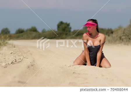 Sexy woman with naked breast on beach - Stock Photo [70408044] - PIXTA