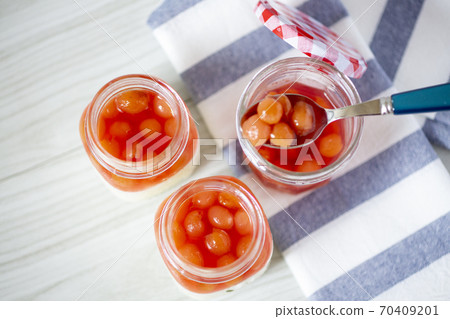 Cherry compote and panna cotta dessert 70409201