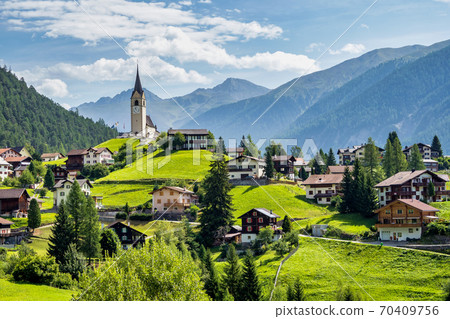 Beautiful Schmitten village at Albula pass in Grisons, Graubuenden, Switzerland Beautiful Schmitten village at Albula pass in Grisons, Graubuenden, Switzerland 70409756