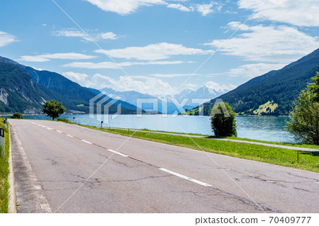 Beautiful view to Lago di Resia, Lake Reschen, Alto Adige, South Tyrol, Italy 70409777