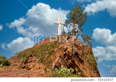 White cross on hil, Aksum Ethiopia 70410547