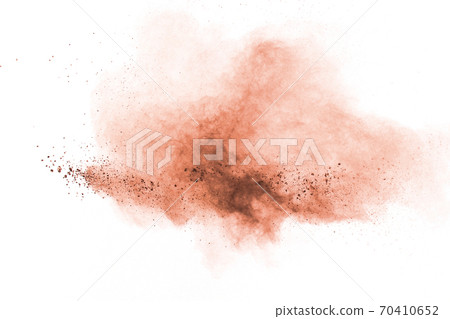 Brown powder explosion on white background. Brown powder explosion on white background. 70410652