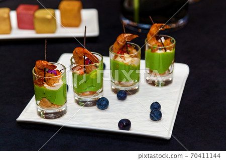 Catering, shrimp snacks for a banquet Catering, shrimp snacks for a banquet 70411144