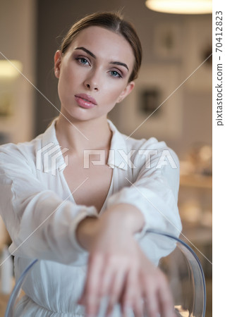 the young woman is resting at home the young woman is resting at home 70412823