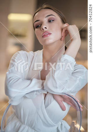 the young woman is resting at home the young woman is resting at home 70412824