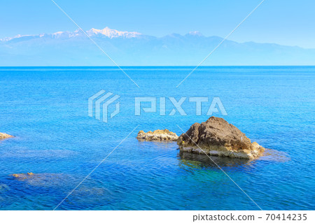 Sea, stone, snow mountains, Peloponnese, Greece Sea, stone, snow mountains, Peloponnese, Greece 70414235