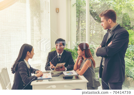 Multi Ethnics Teamwork Collaboration Team Meeting Communication concept in Business people Multi Ethnics Teamwork Collaboration Team Meeting Communication concept in Business people 70414739