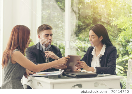Multi Ethnics Teamwork Collaboration Team Meeting Communication concept in Business people Multi Ethnics Teamwork Collaboration Team Meeting Communication concept in Business people 70414740