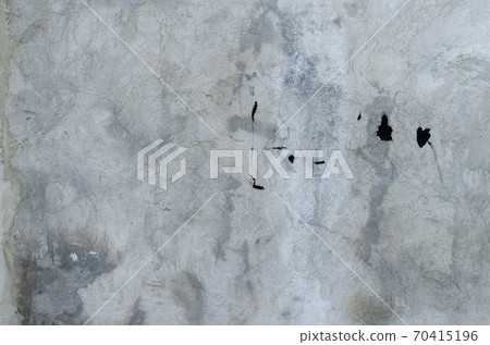 old grey concrete garage wall with spots of black paint with white ventilation grille old grey concrete garage wall with spots of black paint with white ventilation grille 70415196