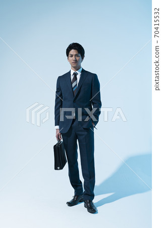 Businessman working Businessman working 70415532