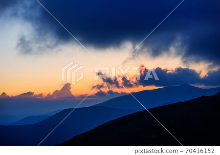 beautiful sunset in the mountains 70416152