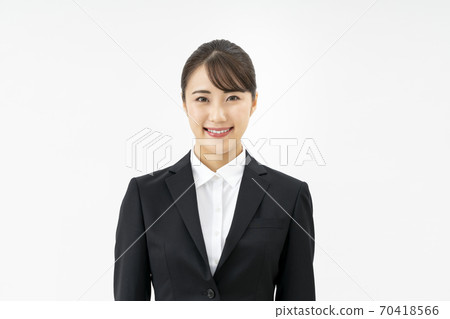 A young lady in a suit 70418566