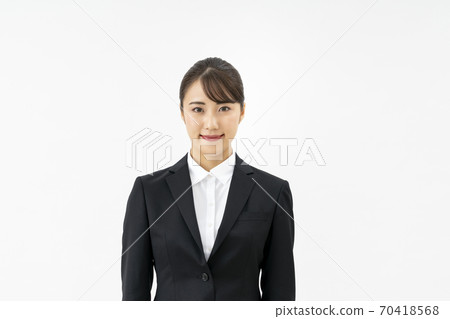 A young lady in a suit 70418568
