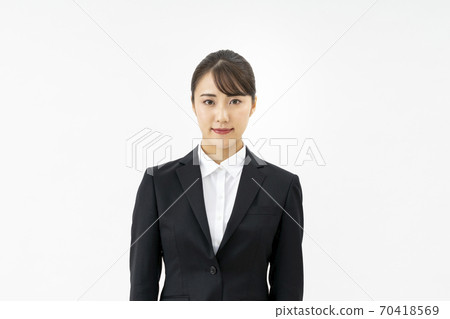 A young lady in a suit 70418569